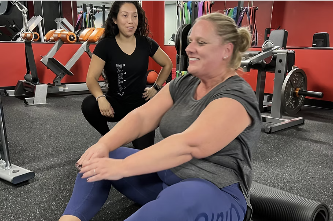 Lifters Guild coach working with a member on mobility and recovery