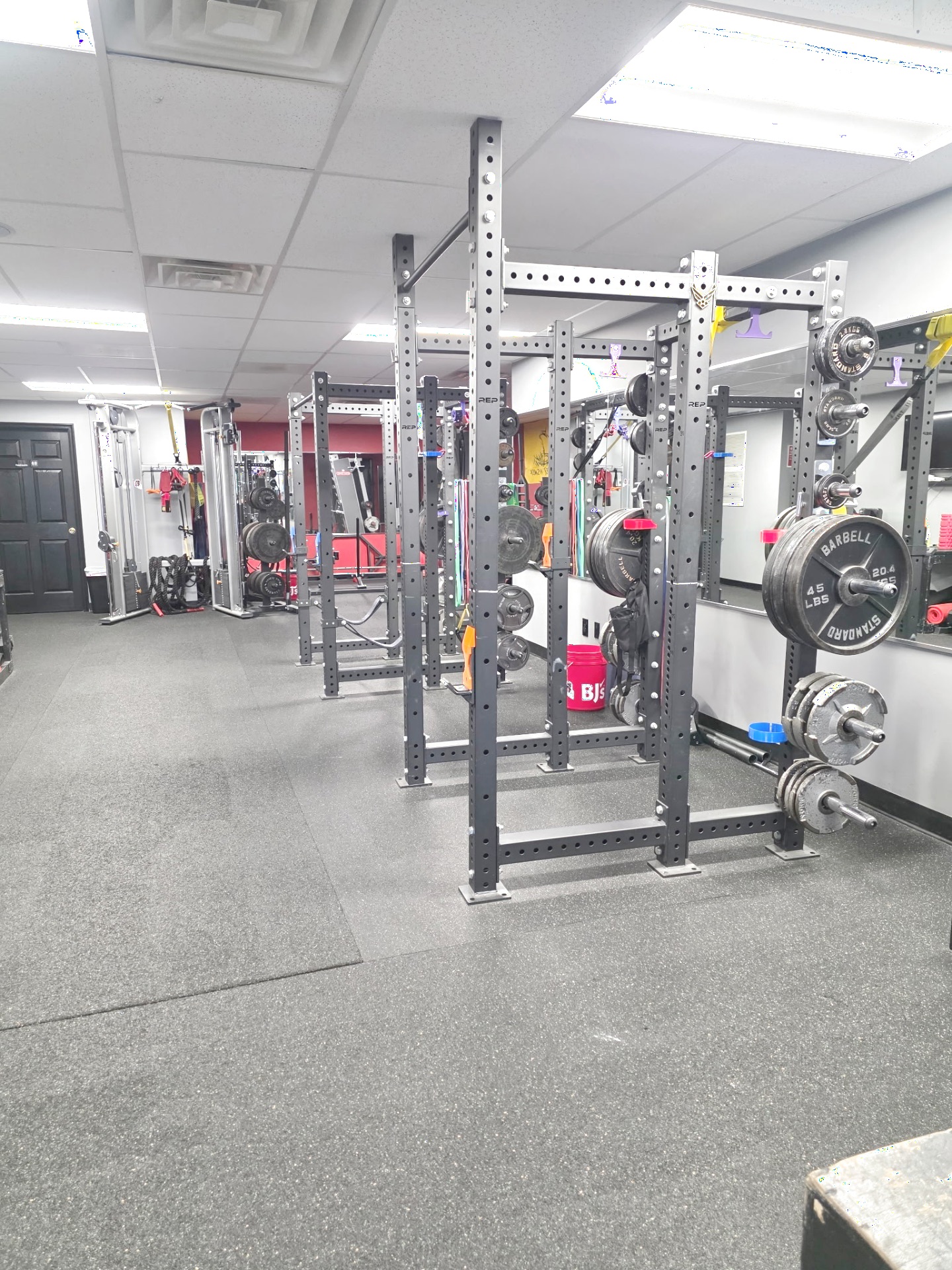 Rack row at The Studio — current training space